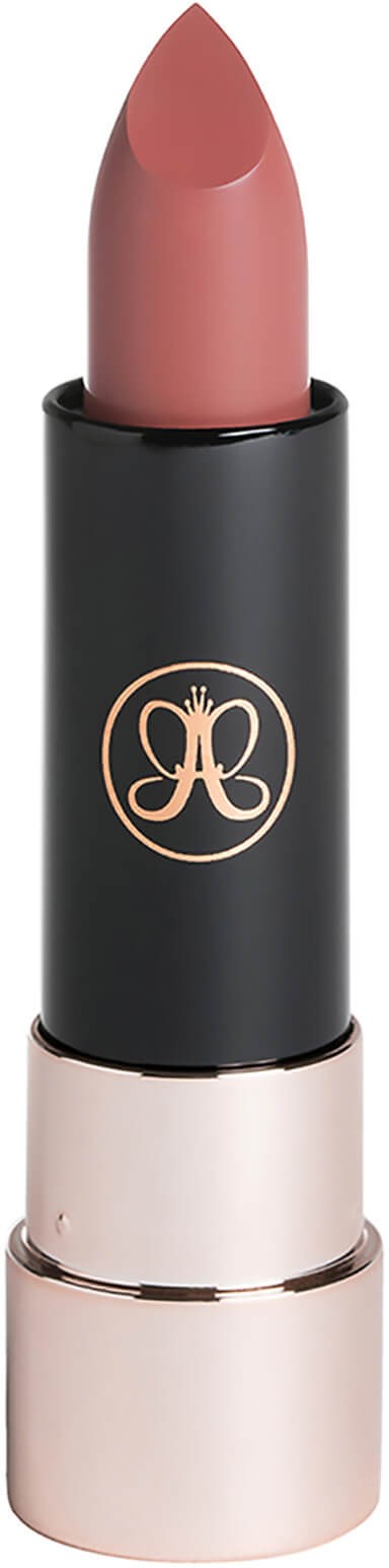 A lipstick with a pink color in a black tube with a gold logo and a beige base.