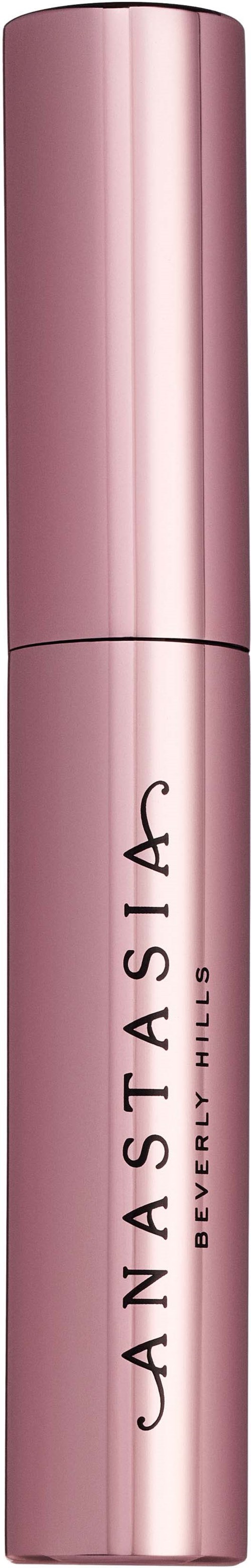 Pink cylindrisk läppstiftsrör med svart text som lyder "Janasta A" på det.