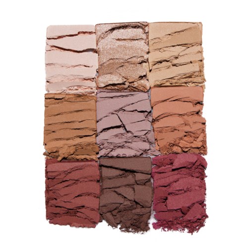 A palette of twelve crushed makeup powders in various neutral shades, arranged in a 3x4 grid on white background.