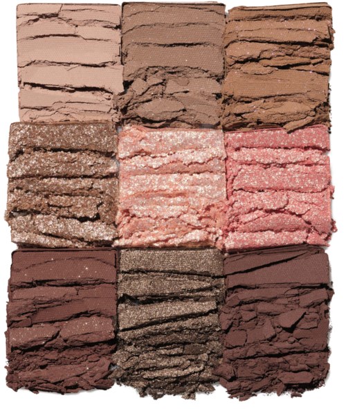 Färgglada ögonskuggspaletter med olika nyanser av rosa, brunt och lila, används för makeup.