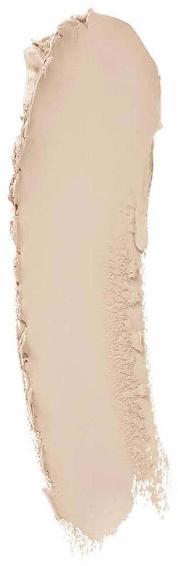 Ett ljusbeige pulver spritt i en lång, kurvig form på en vit bakgrund.
