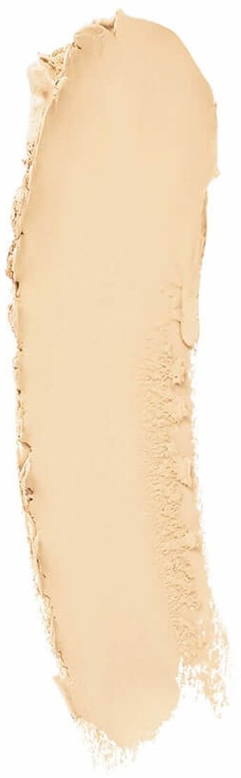 En lång, beige puderutbredning med slät yta och ruffiga kanter.
