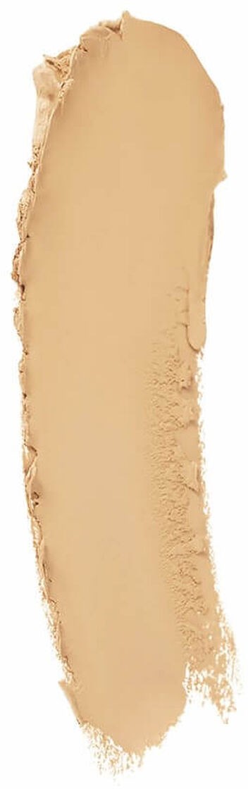 En beige makeup-grundfarve på sort baggrund.