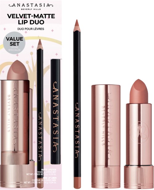 A makeup set with a lipstick, lip liner, and a matching lip balm, all in elegant rose gold packaging.
