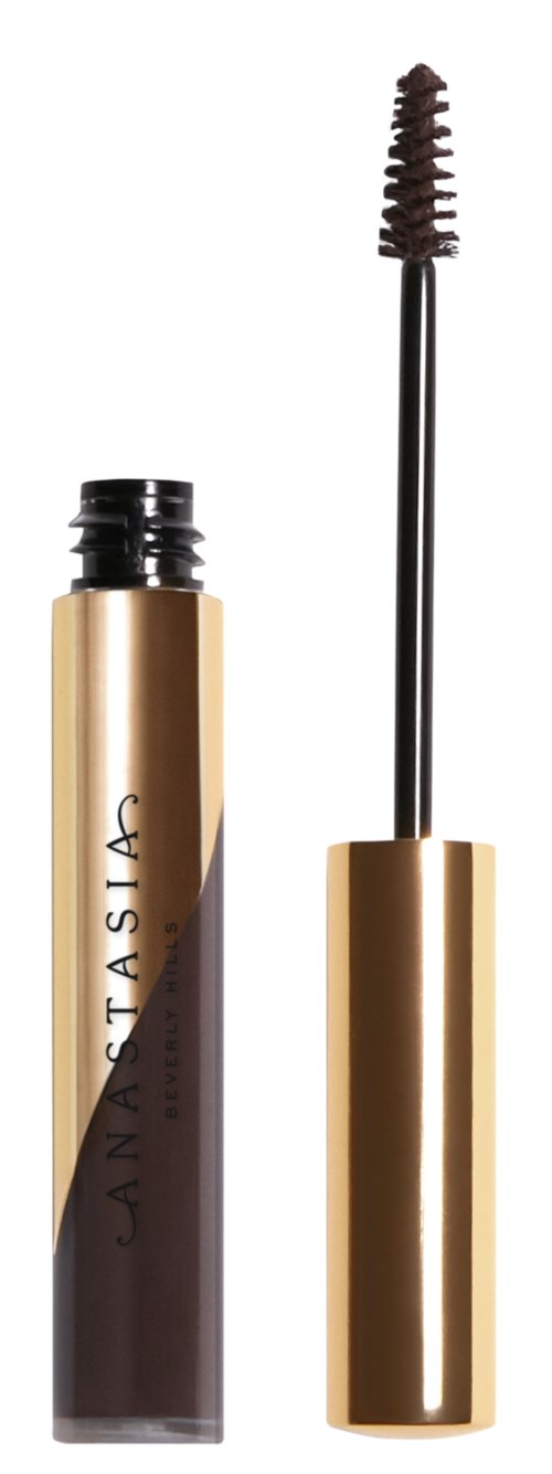Ein Mascara-Gefäß mit Applikator, gold und schwarz, bereit zur Anwendung.