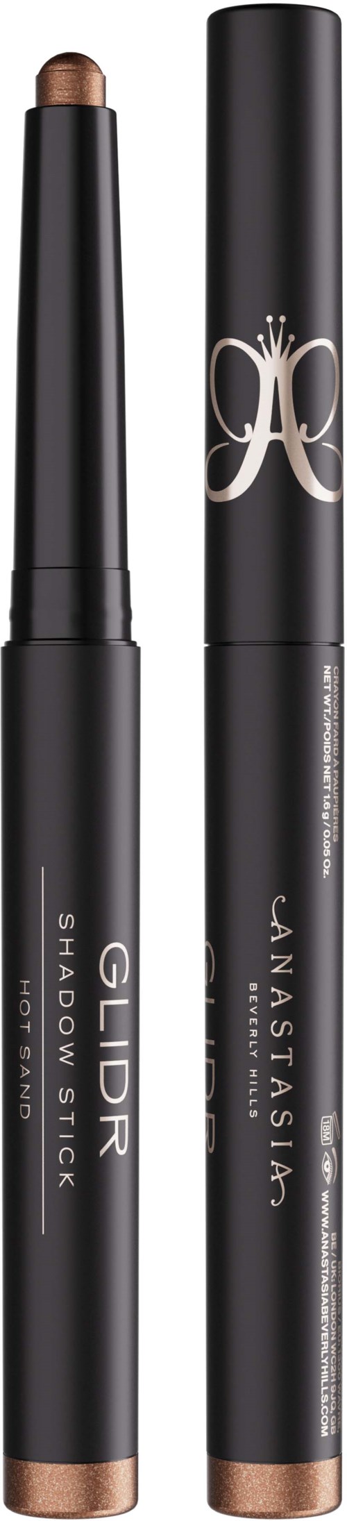 To svarte makeup-staver, en merket 'GILD Shadow Stick' og den andre 'JANSATINA', uten korkene som viser stengene.