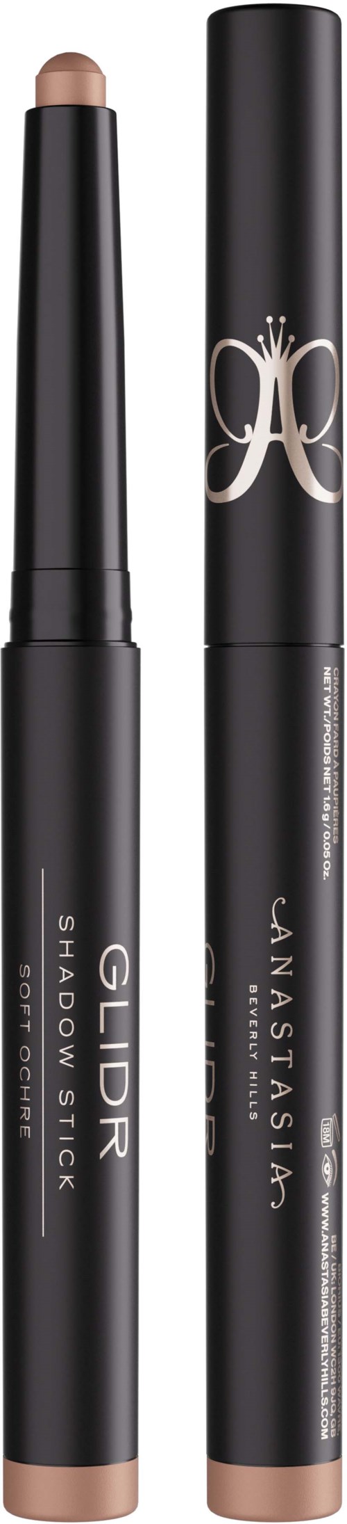 To svarte sminke produkter, en merket 'GILD Shadow Stick' og den andre med et dekorativt sølvmerke.