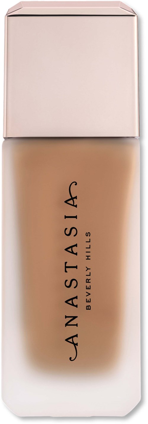 En foundationflaska med frostad glaslook, en silverlock och svart text som säger Anastasia Beverly Hills.