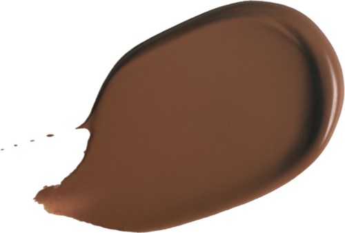 En stor brun smet av flytande, möjligen choklad, med en liten stänk bredvid på vit bakgrund.