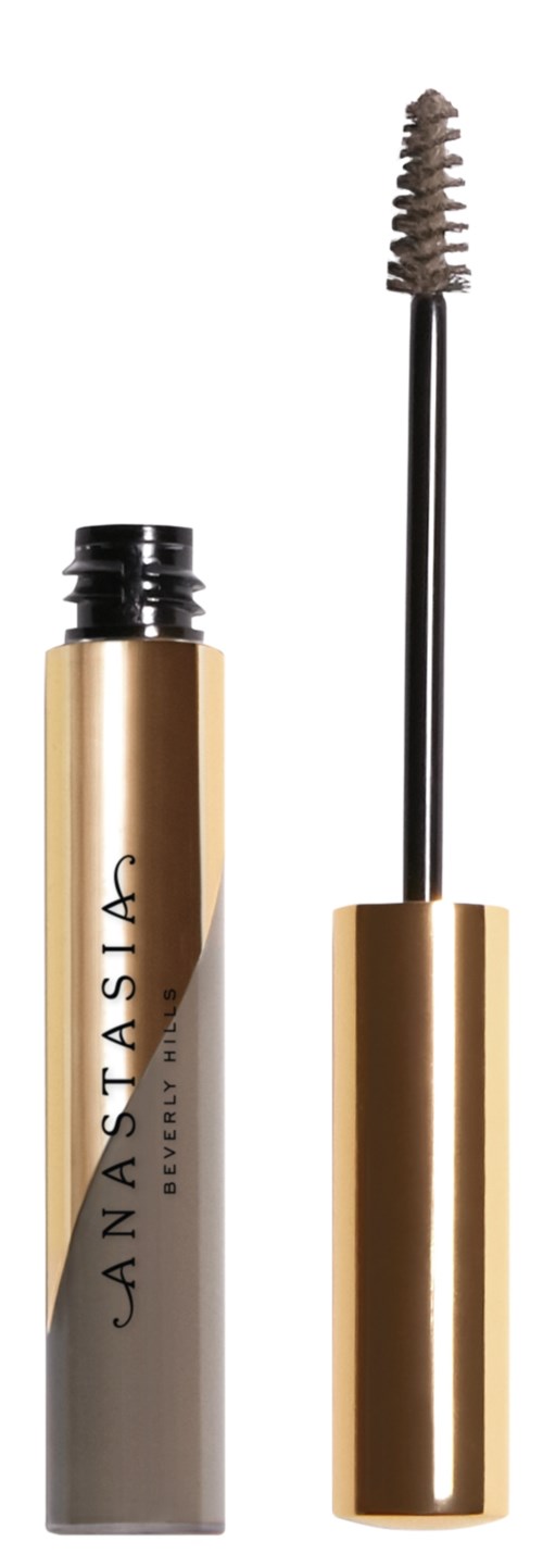 Ett guld- och svart mascara-rör med borsten utplockad, visar borsten och märket Anastasia.