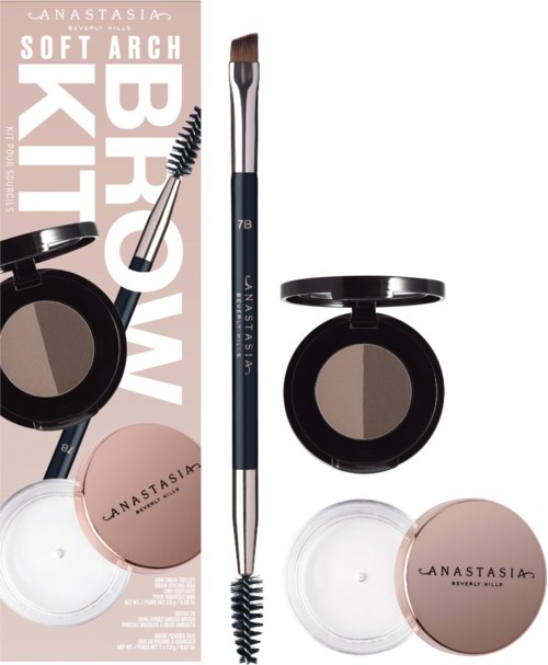 Ett set ögonbrynsmakeupprodukter med borstar, mörka och ljusa puder och en märkt box.