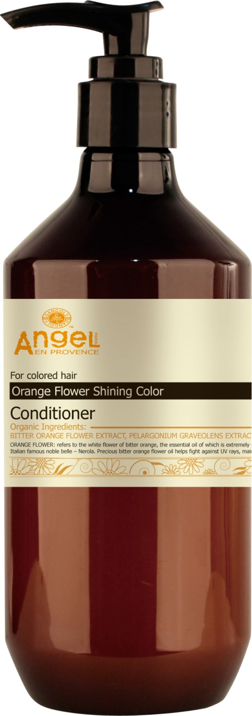 En mörk flaska med pump innehåller orangefärgad hårbalsam, märkt för glänsande, färgat hår.