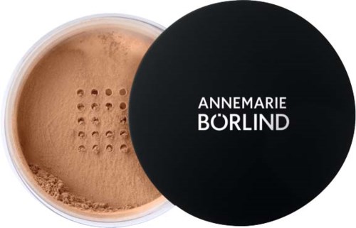 A container of loose powder with a black lid labeled 'ANNEMARIE BØRLIND' covers part of the product.