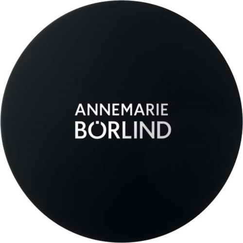 A black circular logo with white text reading "ANNEMARIE BØRLIND" in the center.