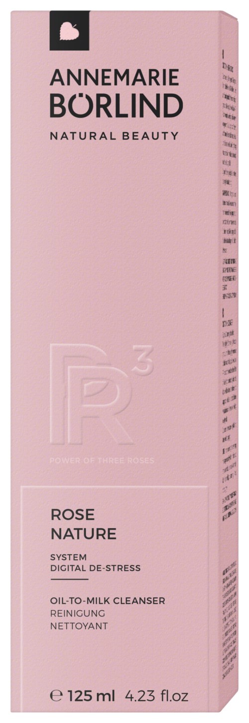 A pink box with black and white text, labeling a skincare product by Annemarie Borlind, with rose and nature themes.