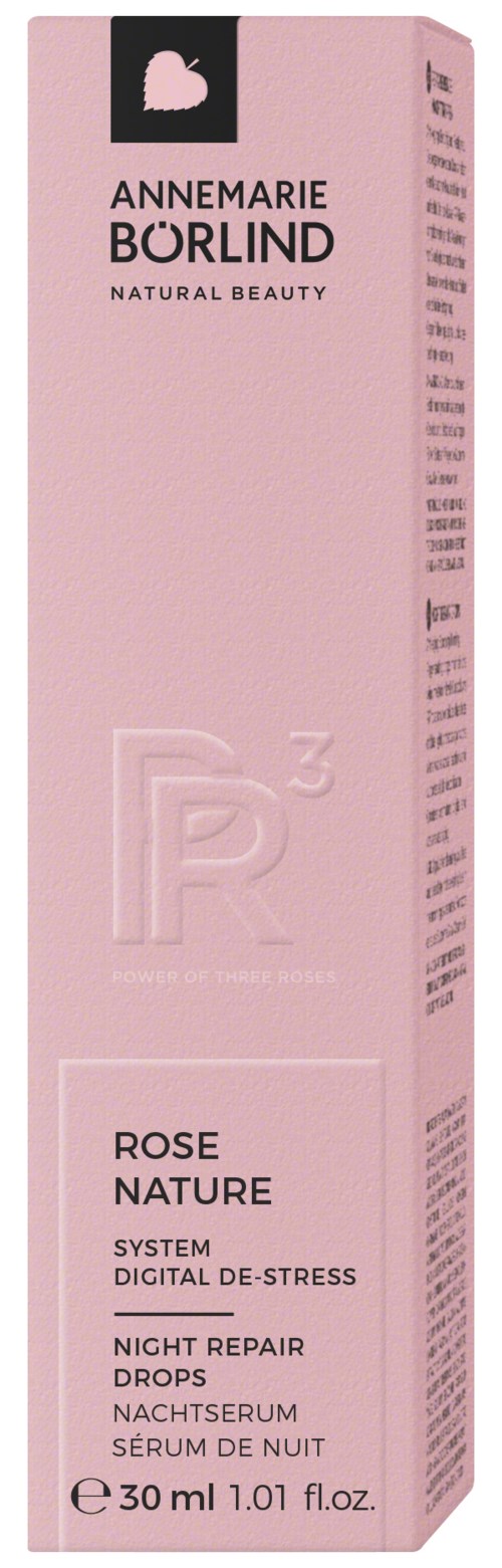 A pink box for Annemarie Borlind night repair drops with rose and nature themes, containing 30 ml of product.