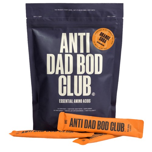 Package of Anti Dad Bod Club supplement with orange flavor, including a pouch and two sachets, on white background.