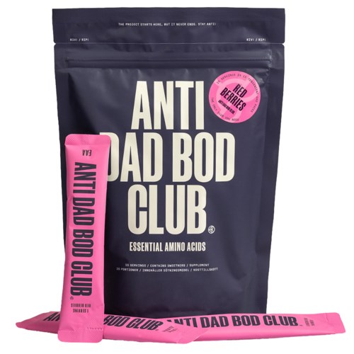A package of Anti Dad Bod Club supplement with pink wristband and label highlighting essential amino acids.