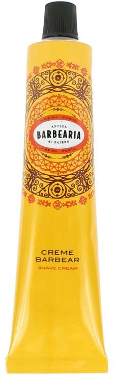 Een gele tube met Barbearia scheerschuim met decoratieve zwarte en rode patronen en een zwarte dop.