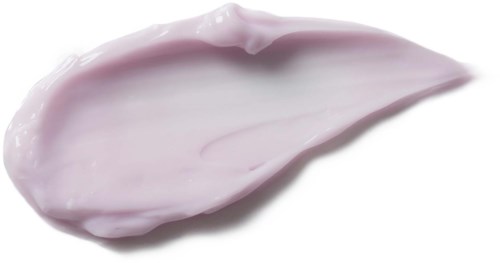 Tölpö vaaleanpunaisesta voiteesta tai lotionista valkoisella taustalla.