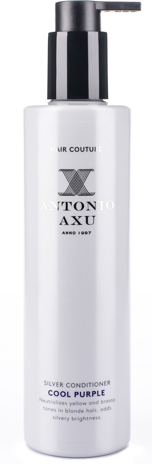 En lång vit flaska med svart pump, märkt som balsam för blont hår, från Antonio Axu.