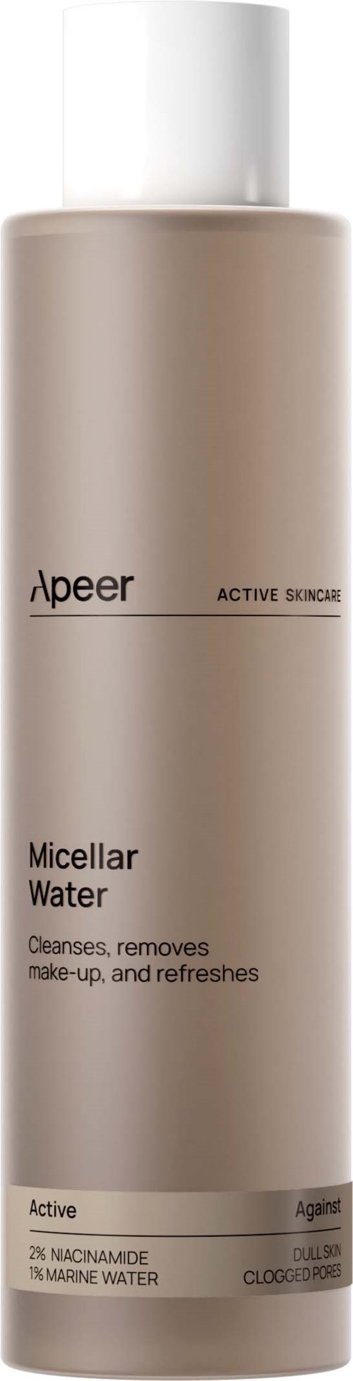 En beige flaske merket 'Apeeer Micellar Water' for rengjøring av huden og fjerning av sminke.