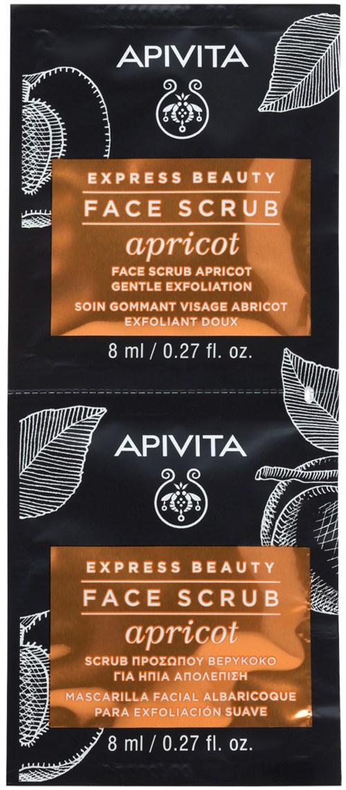 En svart pakke med hvit og oransje tekst som reklamerer en ansiktsskrubb med aprikossmak, små bladillustrasjoner, og merkevaren APIVITA.