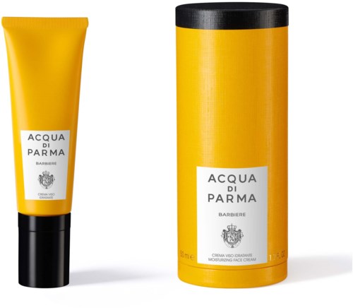 En gul tub och en matchande gul cylindrisk burk, båda märkta "Acqua di Parma" och avsedda för hudvård.