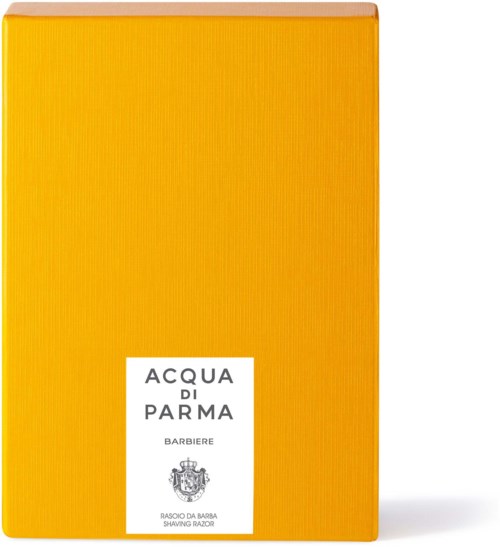 Gult emballage med vit etikett, text nämner Acqua di Parma och rakkniv. Elegant och enkel design.