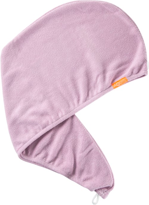 En mjuk rosa hatt som täcker huvud och hals, maker för värme, med en liten orange etikett på sidan.