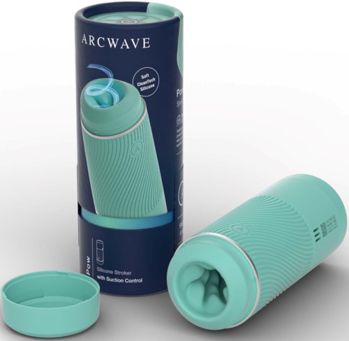 A teal, silicone sex toy with suction control, placed next to its packaging, which shows an image of the toy.