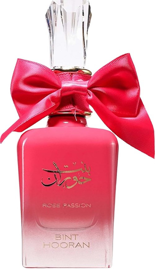 Różowa butelka perfum z dużym czerwonym kokardką i złotym napisem, oznaczona "Ross Passion" i "Bint Hooran."