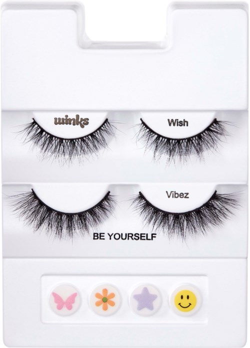 Zwei Paare falscher Wimpern in einer weißen Box, mit kleinen Dekorationssymbolen und der Phrase "BE YOURSELF."