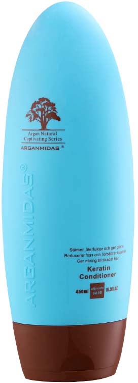 Blauwe fles met bruine dop, gelabeld als keratin conditioner, bevat een boomlogo en productgegevens.