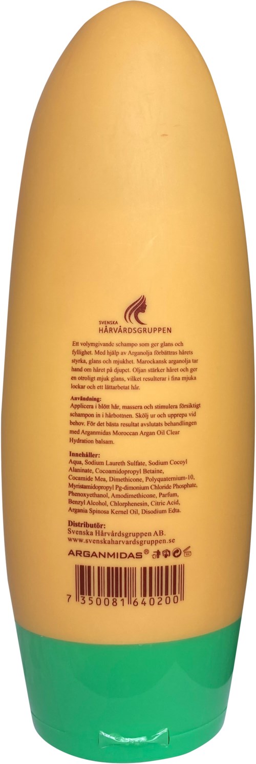 En flaska med gul övre del, grön botten och textdetaljer i mitten.