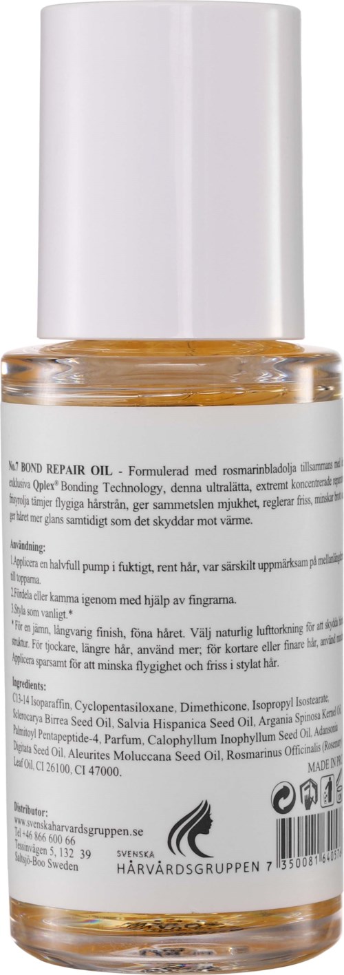 En liten flaska med hår reparationsolja med vit lock och etikett, innehållande en ljus bärnstensfärgad vätska.