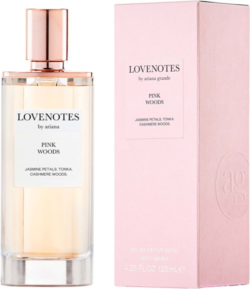 En glasparfume med lyserødt låg og en lyserød æske med produktoplysninger for Lovenotes Pink Woods-duften.