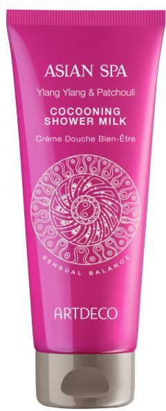 Gul flaska med Asian Spa duschmjölk, logo och text om doft och märke.