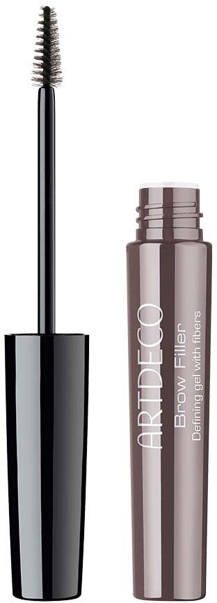 A mascara tube opened, showing the brush with bristles. The tube is brownish with writing on it.