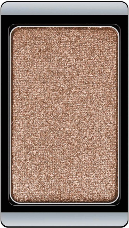 Shimmery beige eyeshadow in a black rectangular palette.