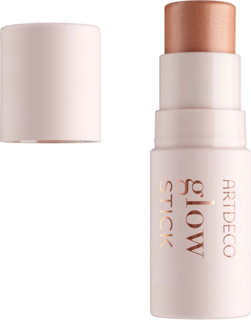 A stick of highlighter makeup with a white base and rose gold cap, displayed with the cap removed to show the product.