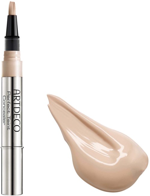 A pen-style concealer with a beige cream swatch next to it showing the product's color and texture.
