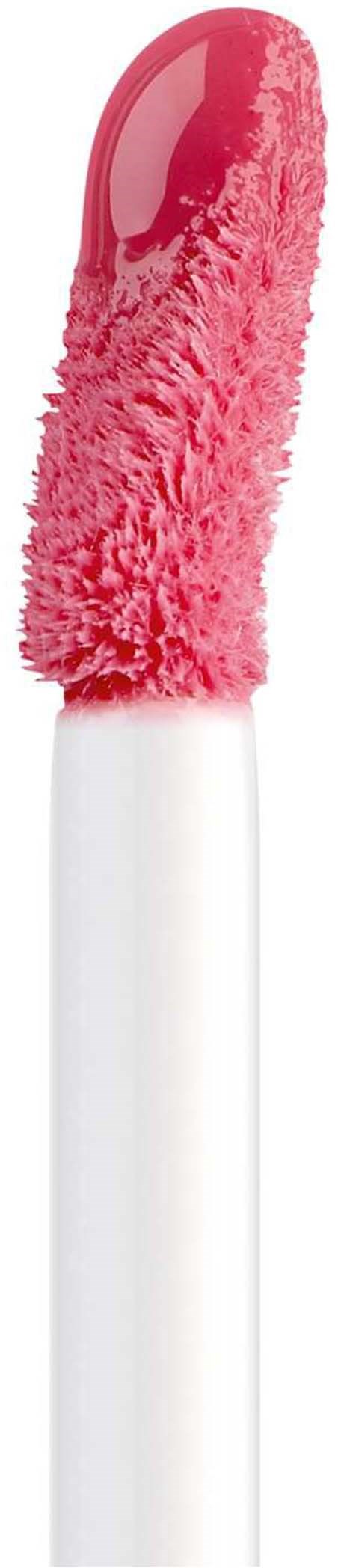 Rosa fluffy makeup-applikator med en blank, rundetip og et hvidt skaft.