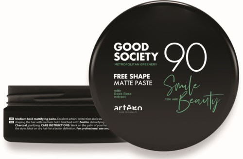 A black container with green and white text for a matte paste hair product, includes words 'Smile Beauty' and 'Good Society.'
