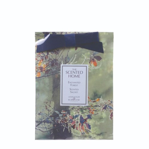 A scented sachet with a forest design and a dark blue bow on top. It is called The Scented Home.