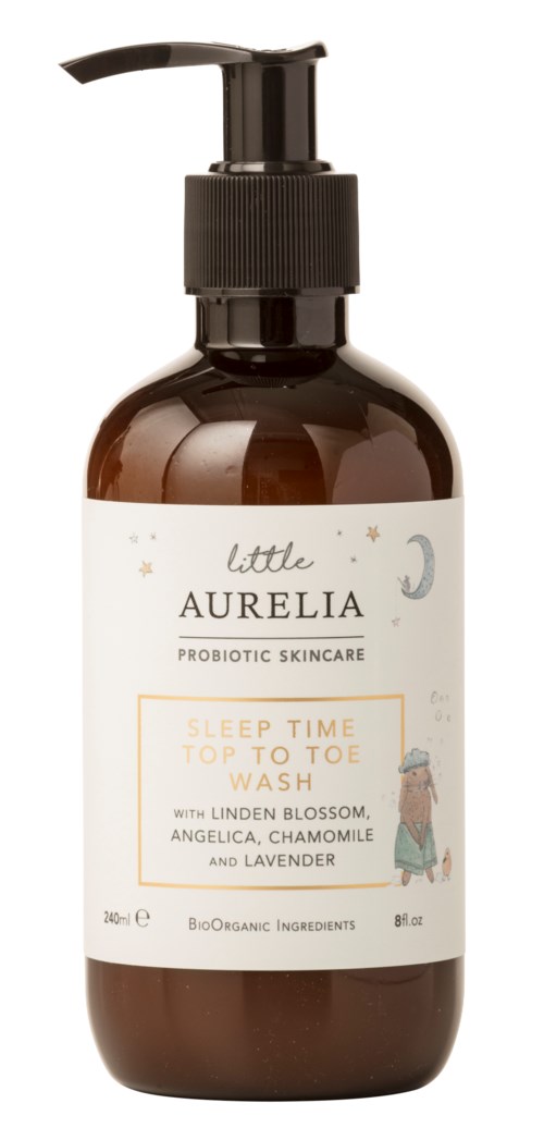 En brun flaska med svart pump-lock, märkt 'Little Aurelia' för söv Wash med lavendel och kamomill, avsett för barn.