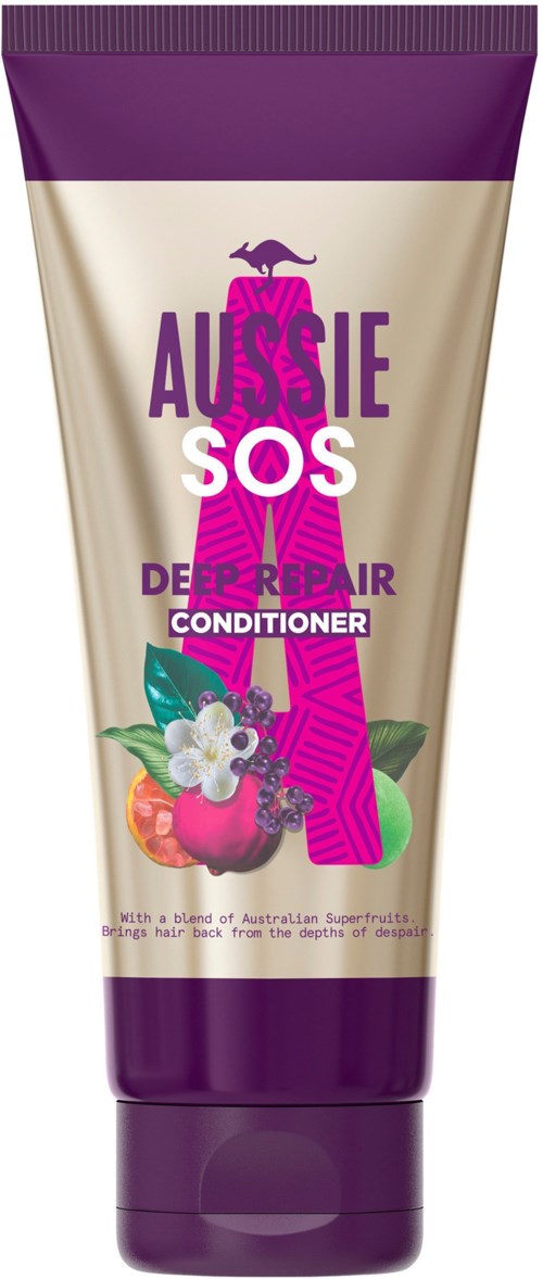 En tub med Aussie SOS Deep Repair Balsam i lila, rosa och vitt, med blommor och frukt på etiketten.
