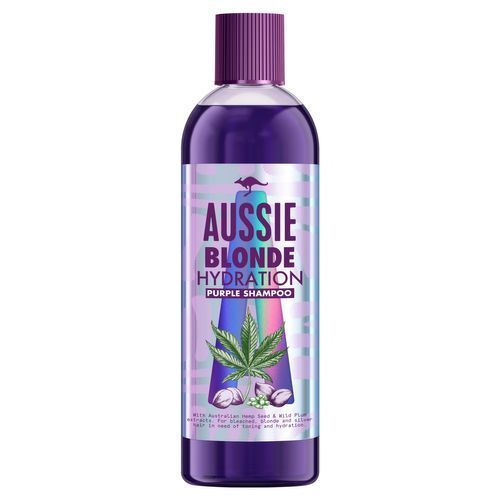 Een paarse shampoo fles met een label met een kangoeroe, een cannabisblad, en informatie over blond haarverzorging.