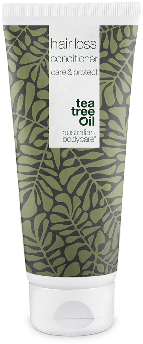 En tube med hårtapbalsam med grønt bladdesign, merket 'tea tree Oil' av Australian Bodycare.