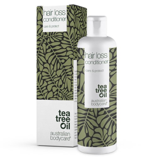 En flaske og eske for hårtapbalsam med tee tree-olje fra Australian Bodycare. Enkel grønn bladdesign.
